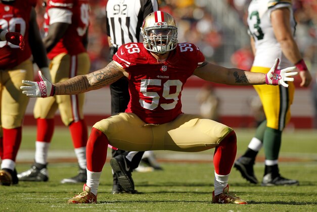 Oct 4, 2015; Santa Clara, CA, USA; San Francisco 49ers outside linebacker Aaron Lynch (59) reacts after recording a sack against the San Francisco 49ers in the fourth quarter at Levi's Stadium. The Packers defeated the 49ers 17-3. Mandatory Credit: Cary Edmondson-USA TODAY Sports
