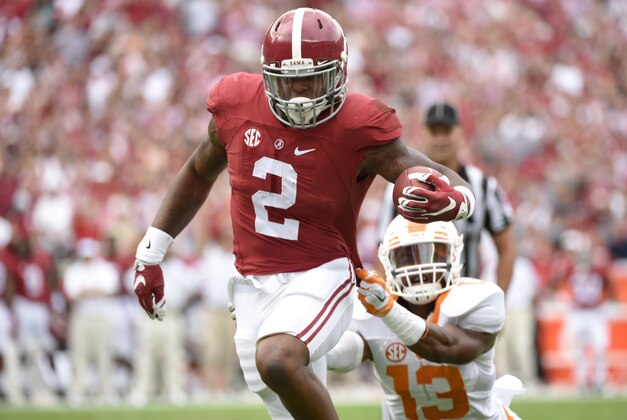 Oct 24, 2015; Tuscaloosa, AL, USA; Alabama Crimson Tide running back Derrick Henry (2) carries for a touchdown against Tennessee Volunteers defensive back Malik Foreman (13) during the first quarter at Bryant-Denny Stadium. Mandatory Credit: John David Mercer-USA TODAY Sports