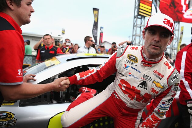 TALLADEGA, AL - OCTOBER 24: Jeff Gordon, driver of the #24 3M Chevrolet, climbs out of his car after qualifying for the NASCAR Sprint Cup Series CampingWorld.com 500 at Talladega Superspeedway on October 24, 2015 in Talladega, Alabama.  (Photo by Patrick Smith/Getty Images)