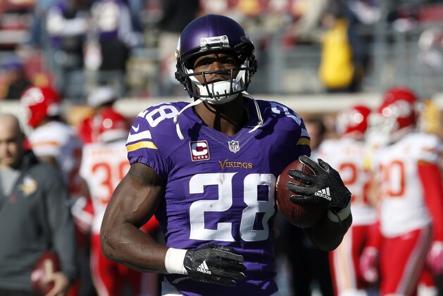 Minnesota Vikings running back Adrian Peterson (28) warms up before an NFL football game against the Kansas City Chiefs, Sunday, Oct. 18, 2015, in Minneapolis. (AP Photo/Ann Heisenfelt)