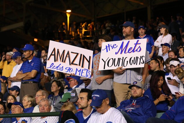 Oct 21, 2015; Chicago, IL, USA; A New York Mets fans in attendance cheer in the sixth inning in game four of the NLCS at Wrigley Field. Mandatory Credit: Aaron Doster-USA TODAY Sports