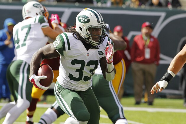 New York Jets running back Chris Ivory runs with the ball against the Washington Redskins during the first half of an NFL football game, Sunday, Oct. 18, 2015, in East Rutherford, N.J. (AP Photo/Gary Hershorn)