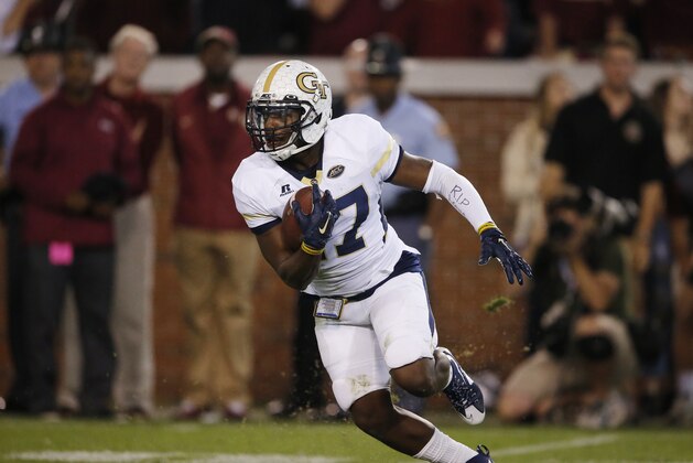 Georgia Tech defensive back Lance Austin (17) runs the ball towards the end zone for a touchdown after picking up a blocked Florida State field goal attempt during the second half of an NCAA college football game, Saturday, Oct. 24, 2015, in Atlanta. Georgia Tech won 22-16. (AP Photo/Mike Stewart)