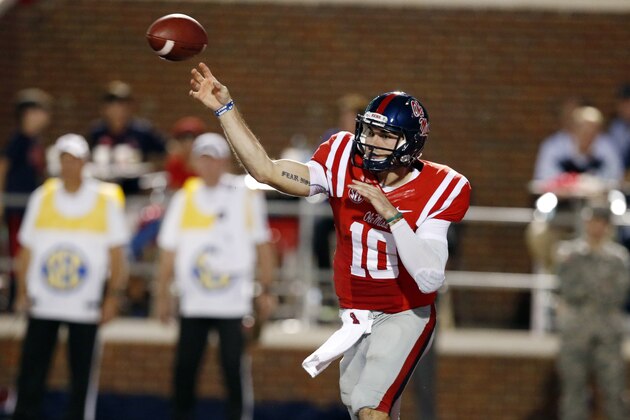 Mississippi quarterback Chad Kelly (10) passes against Texas A&M during the first half of an NCAA college football game in Oxford, Miss., Saturday, Oct. 24, 2015. (AP Photo/Rogelio V. Solis)