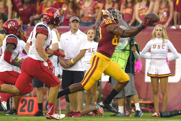 Southern California wide receiver De'Quan Hampton, right, makes a catch under pressure from Utah defensive back Dominique Hatfield, left, and defensive back Chase Hansen during the first half of an NCAA college football game, Saturday, Oct. 24, 2015, in Los Angeles. (AP Photo/Mark J. Terrill) Southern California wide receiver De'Quan Hampton, right, makes a catch under pressure from Utah defensive back Dominique Hatfield, left, and defensive back Chase Hansen during the first half of an NCAA college football game, Saturday, Oct. 24, 2015, in Los Angeles. (AP Photo/Mark J. Terrill)