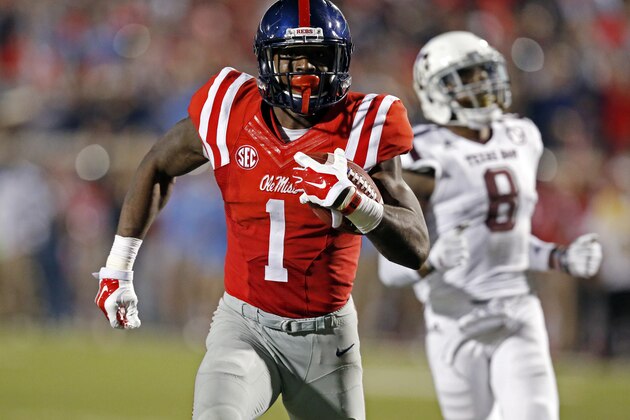 Mississippi wide receiver Laquon Treadwell (1) sprints away from Texas A&M defensive back Nick Harvey (8) for a 58 yard touchdown pass reception during the second half of their NCAA college football game in Oxford, Miss., Saturday, Oct. 24, 2015. No. 24 Mississippi won 23-3. (AP Photo/Rogelio V. Solis)
