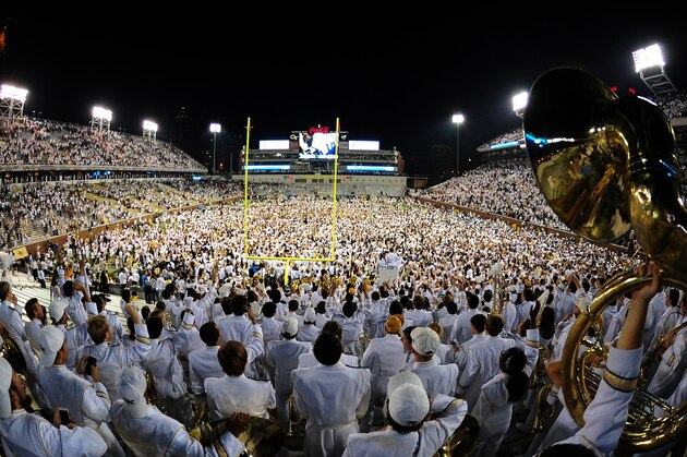 ATLANTA, GA - OCTOBER 24: Fans of the Georgia Tech Yellow Jackets cover the field at Bobby Dodd Stadium after defeating the Florida State Seminoles on a blocked field goal return with no time left on the clock by Lance Austin (not pictured) on October 24, 2015 in Atlanta, Georgia. Photo by Scott Cunningham/Getty Images)