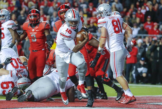 Oct 24, 2015; Piscataway, NJ, USA;  Ohio State Buckeyes quarterback J.T. Barrett (16) crosses the goal line for second quarter touchdown against the Rutgers Scarlet Knights at High Points Solutions Stadium. Mandatory Credit: Jim O'Connor-USA TODAY Sports