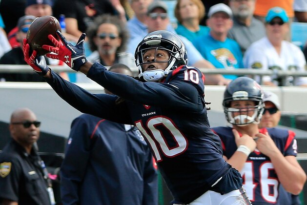 JACKSONVILLE, FL - OCTOBER 18:  DeAndre Hopkins #10 of the Houston Texans attempts a reception during the game against the Jacksonville Jaguars at EverBank Field on October 18, 2015 in Jacksonville, Florida.  (Photo by Sam Greenwood/Getty Images)