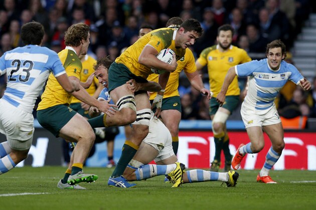 Australia's Rob Simmons makes a run against Argentina during their Rugby World Cup semifinal match at Twickenham Stadium, London, Sunday, Oct. 25, 2015. (AP Photo/Christophe Ena)