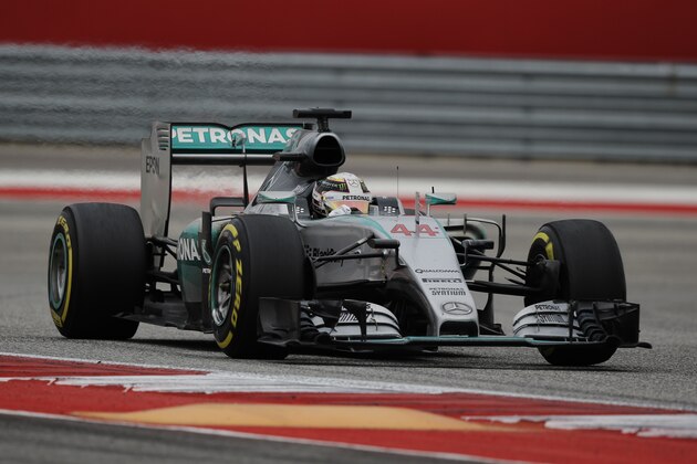 Mercedes driver Lewis Hamilton, of Britain,  races during the Formula One U.S. Grand Prix auto race at the Circuit of the Americas, Sunday, Oct. 25, 2015, in Austin, Texas. (AP Photo/Eric Gay)