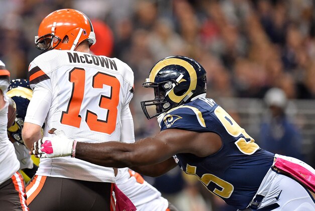 Oct 25, 2015; St. Louis, MO, USA; St. Louis Rams defensive end William Hayes (95) sacks Cleveland Browns quarterback Josh McCown (13) during the first half at the Edward Jones Dome. Mandatory Credit: Jasen Vinlove-USA TODAY Sports