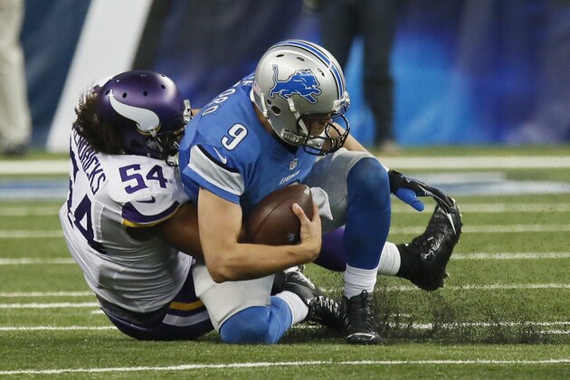 Detroit Lions quarterback Matthew Stafford (9) is sacked by Minnesota Vikings inside linebacker Eric Kendricks (54) during the second half of an NFL football game, Sunday, Oct. 25, 2015, in Detroit. (AP Photo/Duane Burleson)