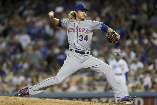 New York Mets starting pitcher Noah Syndergaard works against a Los Angeles Dodgers batter during the seventh inning in Game 5 of baseball's National League Division Series Thursday, Oct. 15, 2015, in Los Angeles. (AP Photo/Alex Gallardo)