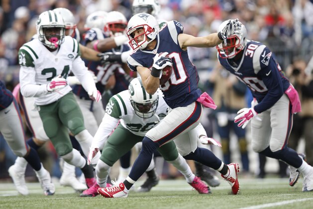 Oct 25, 2015; Foxborough, MA, USA;  New England Patriots wide receiver Danny Amendola (80) evades a tackle by New York Jets corner back Darrin Walls during the third quarter at Gillette Stadium.  The New England Patriots won 30-23. Mandatory Credit: Greg M. Cooper-USA TODAY Sports