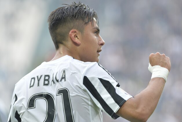 Juventus' Paulo Dybala celebrates after scoring during a Serie A soccer match between Juventus and Atalanta at the Juventus stadium, in Turin, Italy, Sunday, Oct. 25, 2015. (AP Photo/Massimo Pinca)
