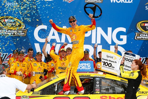 TALLADEGA, AL - OCTOBER 25:  Joey Logano, driver of the #22 Shell Pennzoil Ford, celebrates in Victory Lane after winning the NASCAR Sprint Cup Series CampingWorld.com 500 at Talladega Superspeedway on October 25, 2015 in Talladega, Alabama.  (Photo by Daniel Shirey/Getty Images)