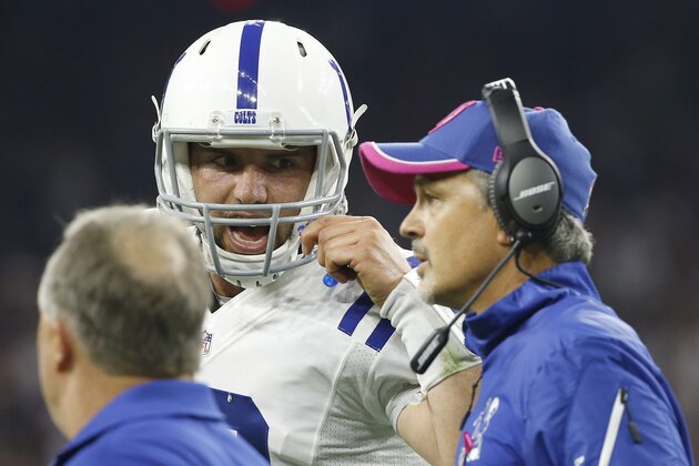 HOUSTON, TX- OCTOBER 09:  Andrew Luck #12 of the Indianapolis Colts talks with head coach Chuck Pagano on the sidelines against the Houston Texans in the first quarter in a NFL game on October 9, 2014 at NRG Stadium in Houston, Texas. (Photo by Scott Halleran/Getty Images)
