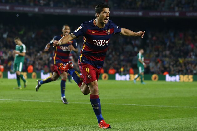 FC Barcelona's Luis Suarez celebrates after scoring against Eibar during a Spanish La Liga soccer match at the Camp Nou stadium in Barcelona, Spain, Sunday, Oct. 25, 2015. (AP Photo/Manu Fernandez)