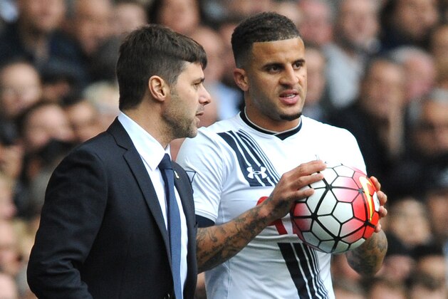 Tottenham manager Mauricio Pochettino talks to Tottenham’s Kyle Walker, right, during the English Premier League soccer match between Tottenham Hotspur and Liverpool at the White Hart Lane, London, England, Saturday, Oct. 17, 2015. (AP Photo/Rui Vieira)