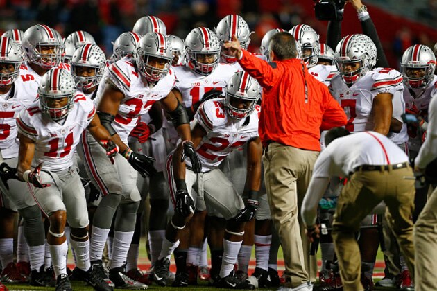 PISCATAWAY, NJ - OCTOBER 24: Head coach Urban Meyer of the Ohio State Buckeyes talks to his team before a game against the Rutgers Scarlet Knights at High Point Solutions Stadium on October 24, 2015 in Piscataway, New Jersey. (Photo by Rich Schultz /Getty Images)