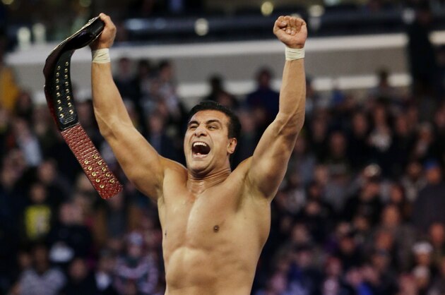 Jose Alberto Rodríguez, of Mexico, known as Alberto Del Rio, celebrates after defeating Jacob