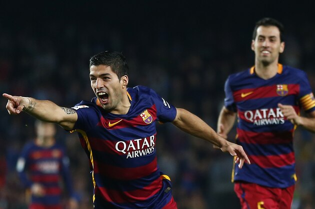 FC Barcelona's Luis Suarez celebrates after scoring against Eibar during a Spanish La Liga soccer match at the Camp Nou stadium in Barcelona, Spain, Sunday, Oct. 25, 2015. (AP Photo/Manu Fernandez)
