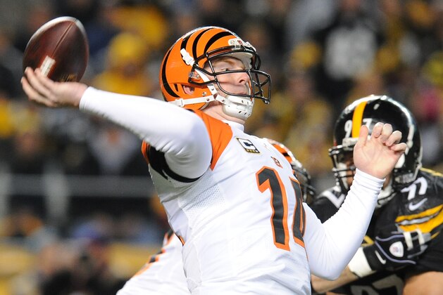 Cincinnati Bengals quarterback Andy Dalton (14) passes in the first quarter an NFL football game against the Pittsburgh Steelers, Sunday, Dec. 28, 2014 in Pittsburgh. (AP Photo/Don Wright)
