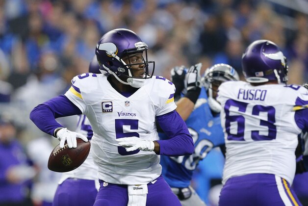 Minnesota Vikings quarterback Teddy Bridgewater (5) looks to pass during the first half of an NFL football game against the Detroit Lions, Sunday, Oct. 25, 2015, in Detroit. (AP Photo/Rick Osentoski)