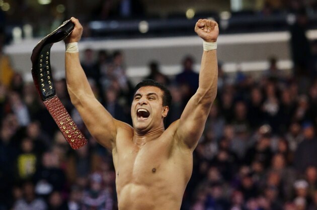 Jose Alberto Rodríguez, of Mexico, known as Alberto Del Rio, celebrates after defeating Jacob