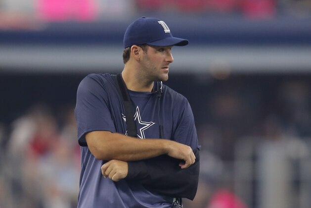 Dallas Cowboys' Tony Romo watches from the sideline during the first half of an NFL football game against the New England Patriots, Sunday, Oct. 11, 2015, in Arlington, Texas. (AP Photo/Brandon Wade)