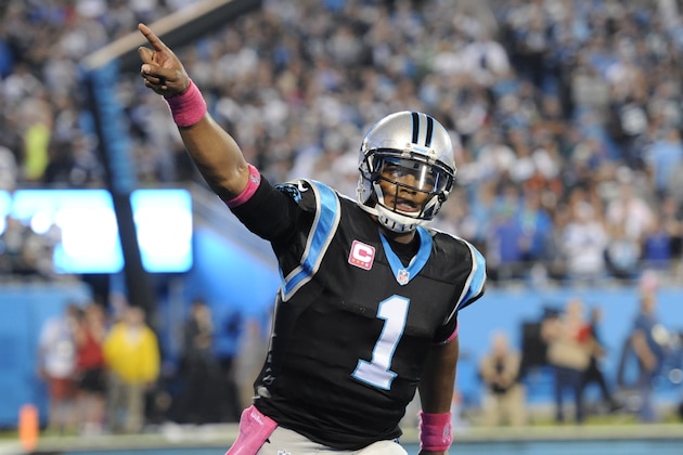 Carolina Panthers' Cam Newton (1) celebrates a Panthers' touchdown against the Philadelphia Eagles in the first half of  an NFL football game in Charlotte, N.C., Sunday, Oct. 25, 2015. (AP Photo/Mike McCarn)
