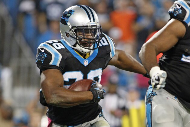 Carolina Panthers' Jonathan Stewart (28) runs against the Philadelphia Eagles in the first half of  an NFL football game in Charlotte, N.C., Sunday, Oct. 25, 2015. (AP Photo/Bob Leverone)