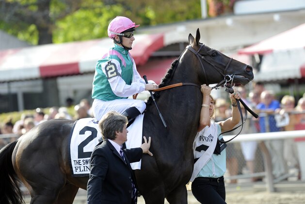 Flintshire (2), with Vincent Cheminaud during the post parade prior to The Sword Dancer Stakes at Saratoga Race Course in Saratoga Springs, N.Y., Saturday, Aug. 29, 2015. (AP Photo/Hans Pennink)