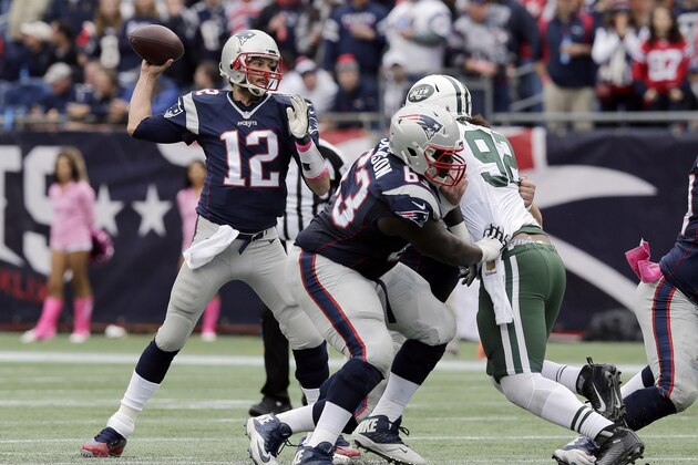 New England Patriots quarterback Tom Brady (12)  passes against the New York Jets during the first half of an NFL football game, Sunday, Oct. 25, 2015, in Foxborough, Mass. (AP Photo/Charles Krupa)