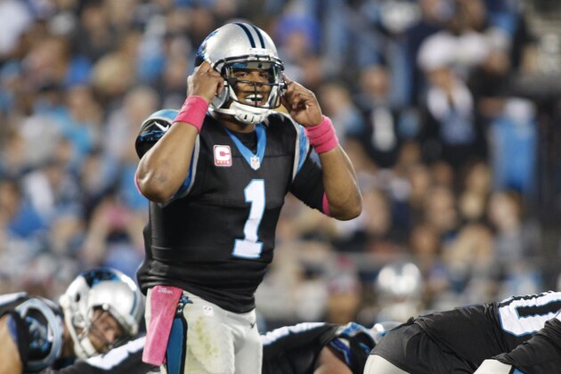 Carolina Panthers' Cam Newton (1) calls a play at the line of scrimmage against the Philadelphia Eagles in the second half of an NFL football game in Charlotte, N.C., Sunday, Oct. 25, 2015. (AP Photo/Bob Leverone)