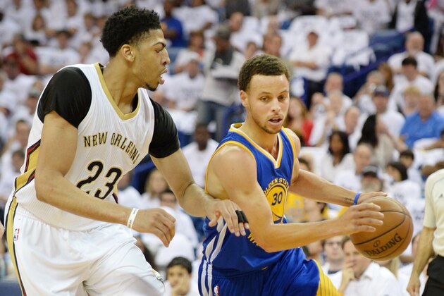 NEW ORLEANS, LA - APRIL 25: Stephen Curry #30 of the Golden State Warriors drives against Anthony Davis #23 of the New Orleans Pelicans during Game Four of the Western Conference Quarterfinals during the NBA Playoffs at Smoothie King Center on April 25, 2015 in New Orleans, Louisiana. NOTE TO USER: User expressly acknowledges and agrees that, by downloading and/or using this Photograph, user is consenting to the terms and conditions of the Getty Images License Agreement. Mandatory Copyright Notice: Copyright 2014 NBAE (Photo by Noah Graham/NBAE via Getty Images)