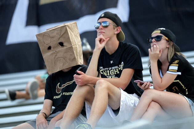 ORLANDO, FL - OCTOBER 24:  A UCF fan with a bag covering his head watches the NCAA football game between the Houston Cougars and the UCF Knights at Bright House Networks Stadium on October 24, 2015 in Orlando, Florida. Houston won the game 59-10, and UCF fell to 0-8 on the season. (Photo by Alex Menendez/Getty Images)