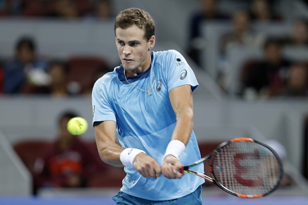 BEIJING, CHINA - OCTOBER 07:  Vasek Pospisil of Canada returns a shot against Rafael Nadal of Spain during the Men's singles Second round match on day five of the 2015 China Open at the China National Tennis Centre on October 7, 2015 in Beijing, China.  (Photo by Lintao Zhang/Getty Images)