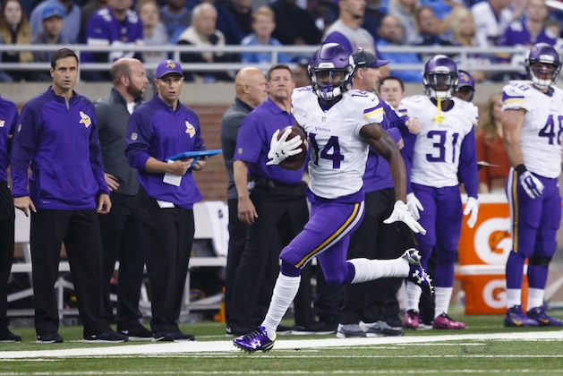 Minnesota Vikings wide receiver Stefon Diggs (14) rushes against the Detroit Lions during an NFL football game, Sunday, Oct. 25, 2015, in Detroit. (AP Photo/Rick Osentoski)