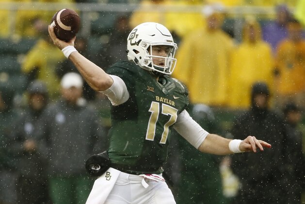 Baylor's Seth Russell throws a pass in the first half of an NCAA college football game against Iowa State, Saturday, Oct. 24, 2015, in Waco, Texas. (AP Photo/Tony Gutierrez)