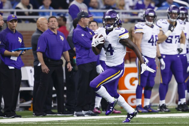 Minnesota Vikings wide receiver Stefon Diggs (14) rushes against the Detroit Lions during an NFL football game, Sunday, Oct. 25, 2015, in Detroit. (AP Photo/Rick Osentoski)