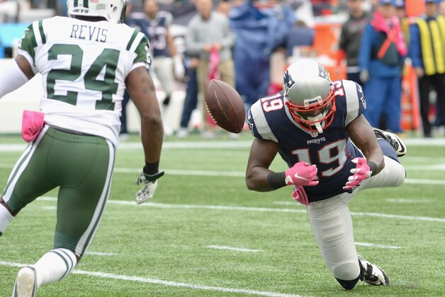 FOXBORO, MA - OCTOBER 25:  Brandon LaFell #19 of the New England Patriots drops a pass as Darrelle Revis #24 of the New York Jets defends during the second quarter at Gillette Stadium on October 25, 2015 in Foxboro, Massachusetts.  (Photo by Darren McCollester/Getty Images)