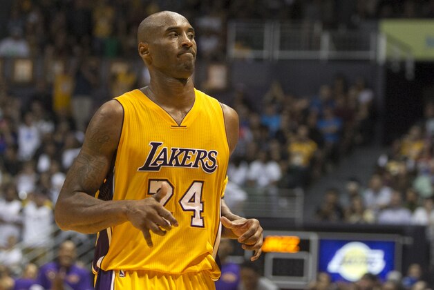 Los Angeles Lakers guard Kobe Bryant (24) is seen on the court during the second half of an NBA preseason basketball game against the Utah Jazz, Tuesday, Oct. 6, 2015, in Honolulu.  The Jazz defeated the Lakers 117-114.  (AP Photo/Marco Garcia)
