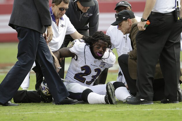 Baltimore Ravens free safety Kendrick Lewis (23) is tended to after being injured against the San Francisco 49ers during the second half of an NFL football game in Santa Clara, Calif., Sunday, Oct. 18, 2015. (AP Photo/Marcio Jose Sanchez)