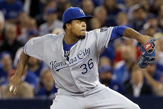 Kansas City Royals starting pitcher Edinson Volquez throws against the Toronto Blue Jays during the first inning in Game 5 of baseball's American League Championship Series on Wednesday, Oct. 21, 2015, in Toronto. (AP Photo/Tim Donnelly)