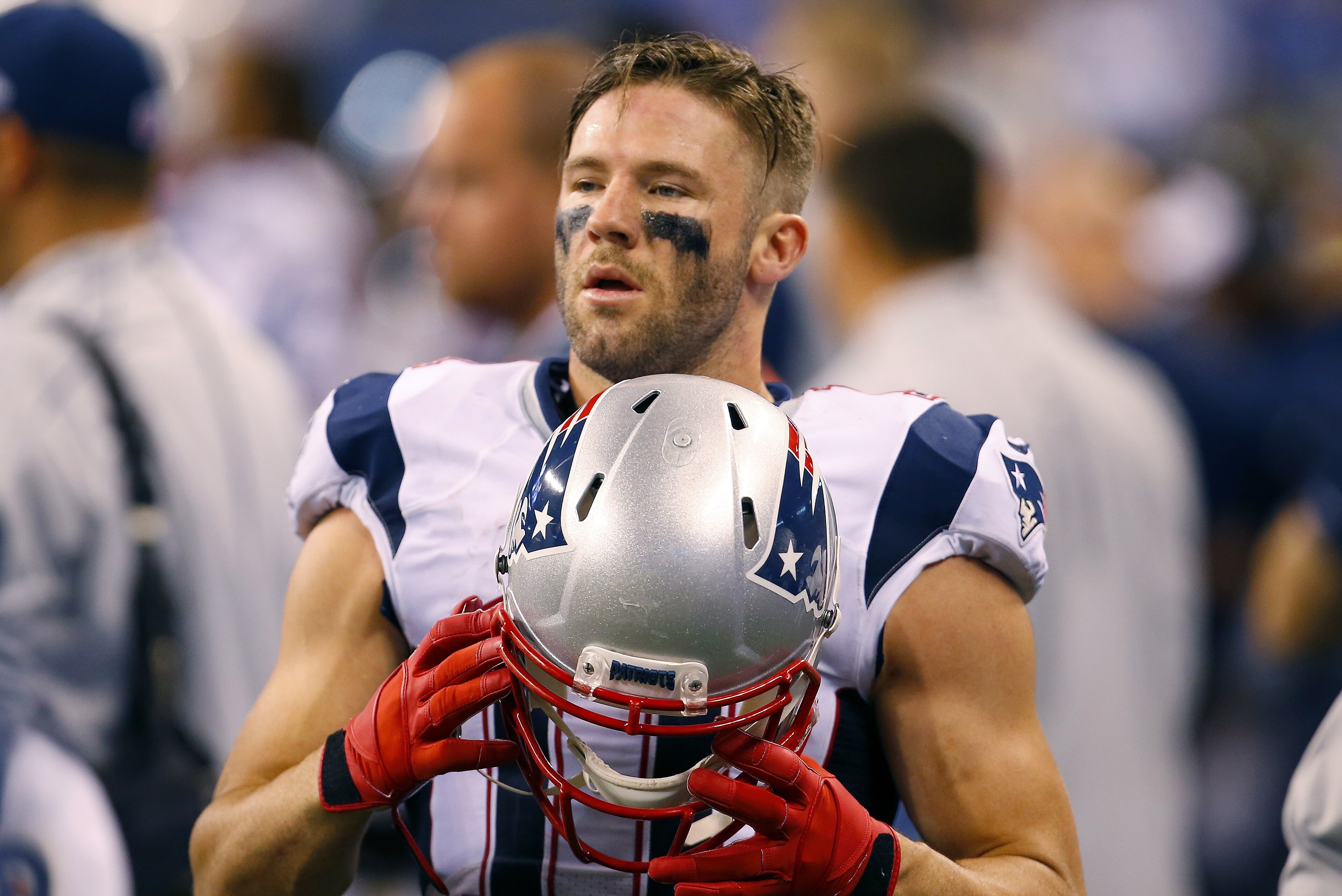New England Patriots wide receiver Julian Edelman (11) walks in the bench area during an NFL football game against the Indianapolis Colts in Indianapolis, Sunday, Oct. 18, 2015.  (Jeff Haynes/AP Images for Panini)