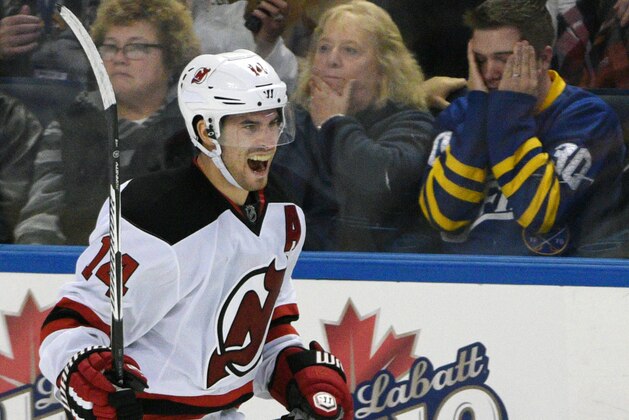 New Jersey Devils left winger Adam Henrique celebrates a short-handed goal during the third period of an NHL hockey game against the Buffalo Sabres, Saturday, Oct. 24, 2015, in Buffalo, N.Y. New Jersey won 4-3. (AP Photo/Gary Wiepert)