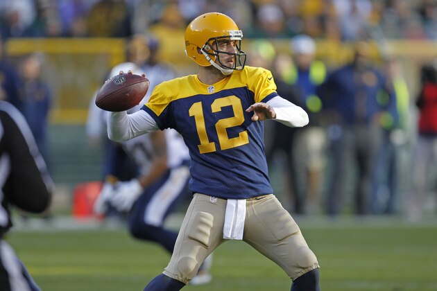Green Bay Packers quarterback Aaron Rodgers passes against the San Diego Chargers during an NFL football game Sunday Oct. 18, 2015, in Green Bay, Wis. (AP Photo/Matt Ludtke)
