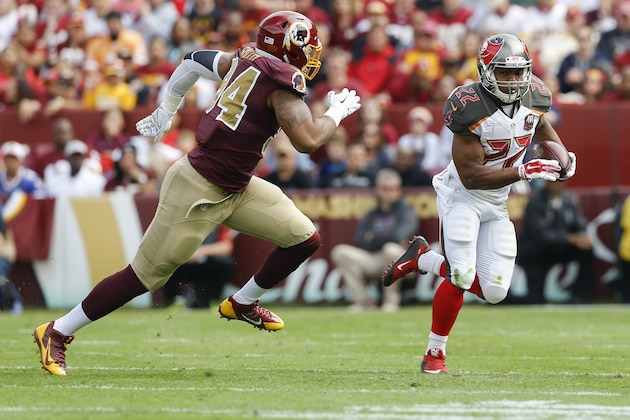 Washington Redskins linebacker Preston Smith (94) chase Tampa Bay Buccaneers running back Doug Martin (22) during the first half of an NFL football game in Landover, Md., Sunday, Oct. 25, 2015. (AP Photo/Patrick Semansky)